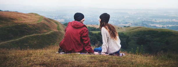 istock People Rear View Sitting Mountain Carefree Togetherness Concept 822260882