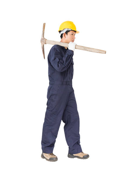 istock Man in uniform hold old pick mattock that is a mining device 822265336