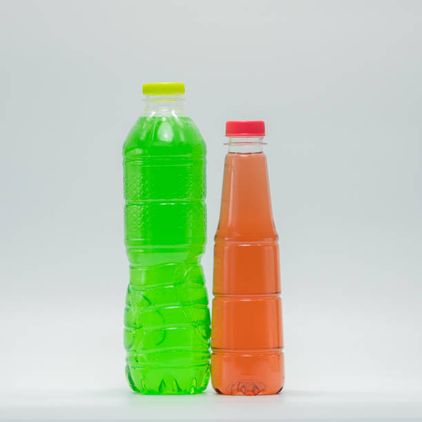 istock Two bottles of soft drink in modern plastic packaging on white background 822268522