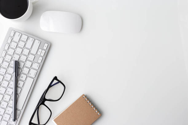 istock Modern White office desk top table with ... and other supplies. Top view with copy space on white background. Top view, flat lay. 822280870