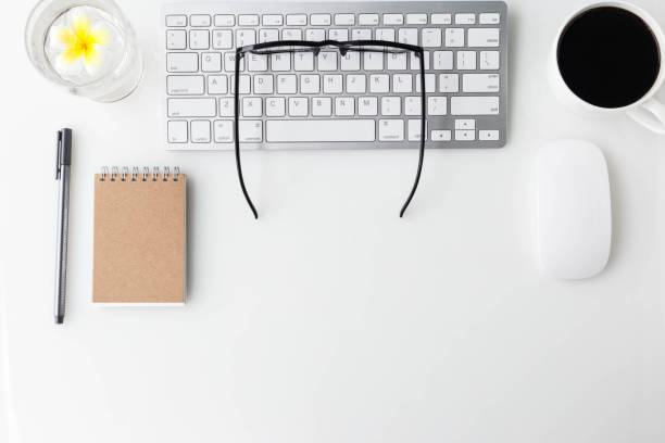 istock Modern White office desk top table with ... and other supplies. Top view with copy space on white background. Top view, flat lay. 822281254