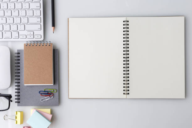 istock Modern White office desk top table with ... and other supplies. Top view with copy space on white background. Top view, flat lay. 822285264