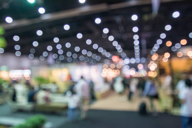istock Abstract people walking in exhibition blurred background 822301884