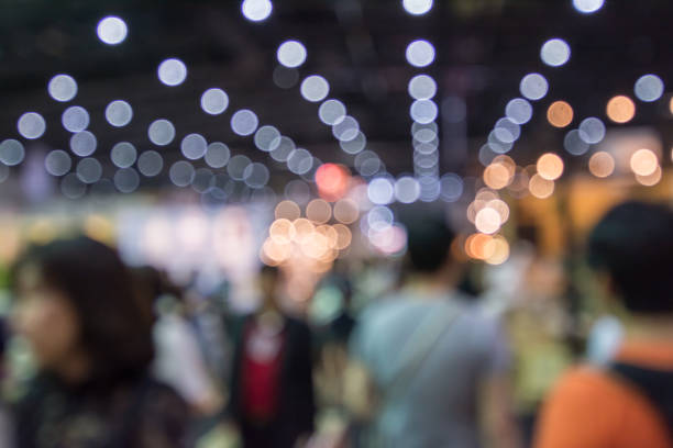 istock Abstract people walking in exhibition blurred background 822302164