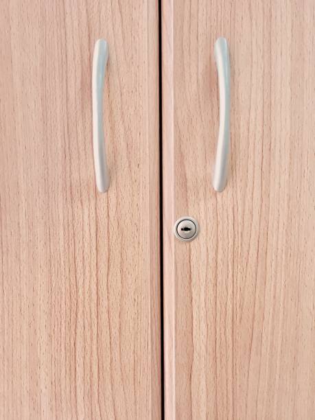 istock Wooden Cabinet with Door, Handle and Keyhole 822321974
