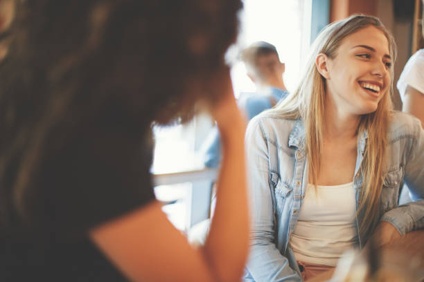 istock Friends laughing in a cafe 822381090
