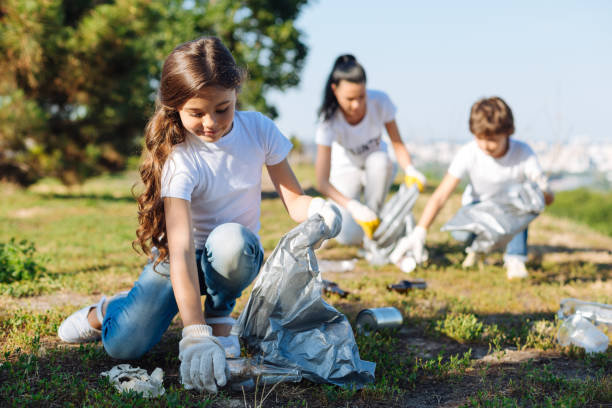 istock Delighted girl working in volunteer group 822381898