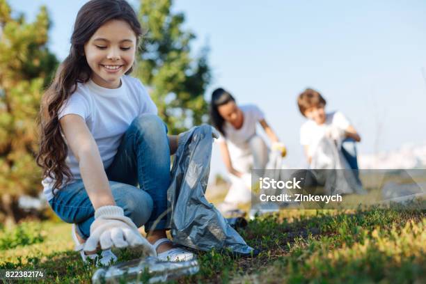 Kind Children Doing School Tasks Stock Photo - Download Image Now - Recycling, Garbage, Child