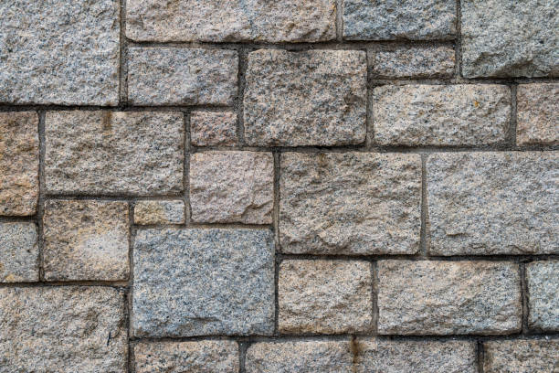 istock Stone block wall,  Surface texture of fence wall 822399468