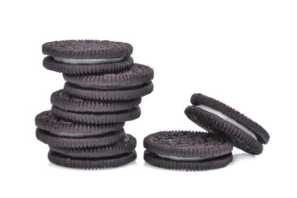 istock sandwich chocolate cookies with cream on white background 822421038
