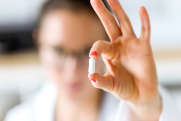 istock Female doctor giving you a pill. 822457178