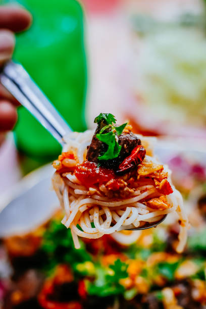 istock Rice noodle with spicy pork sauce and tomato 822475954