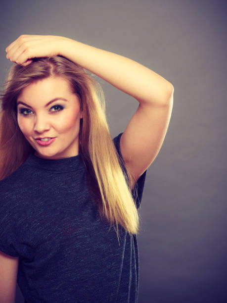 istock Attractive blonde woman with windblown hair 822478046