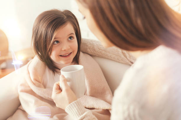istock Beautiful kid listening attentively her mom 822491334