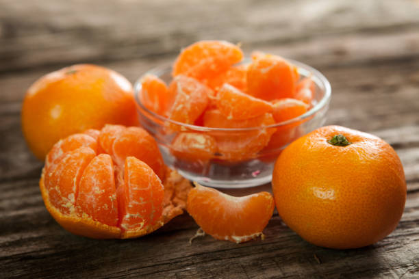 istock Tasty peeled and unpeeled clementines 822500148