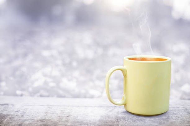 istock Tea mug on wooden surface in winter 822500364