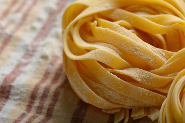 istock raw italian pasta, food closeup 822516702