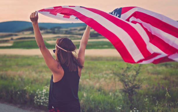 istock Woman with USA Flag 822520356