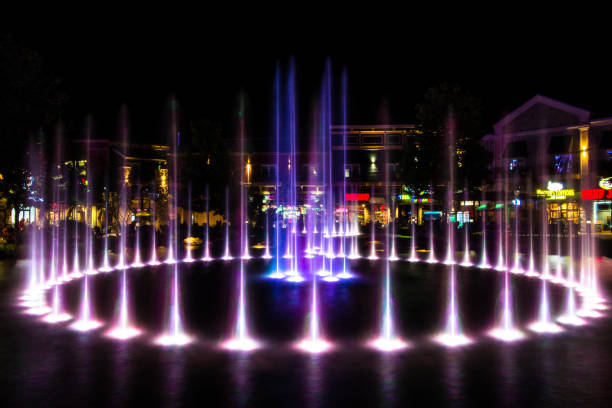 Pigeon Forge, Tennessee, USA - May 15, 2017: Illuminated musical fountains at the Island entertainment complex in the Tennessee resort town of Pigeon Forge.