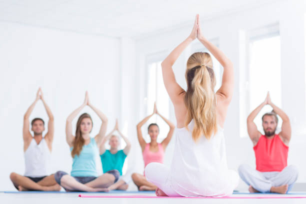 istock Low angle of yoga group 822524464