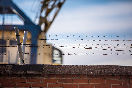 barbed wire over the fence