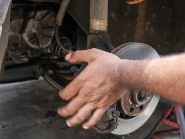 istock People hand working maintenance fixing and repair front disc brake 822531782