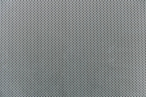istock Gray metal background, round perforated metal texture 822533980
