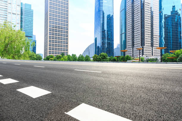 istock empty asphalt road and modern buildings in shanghai 822540334