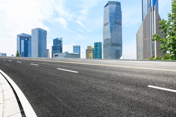 istock empty asphalt road and modern buildings in shanghai 822540340