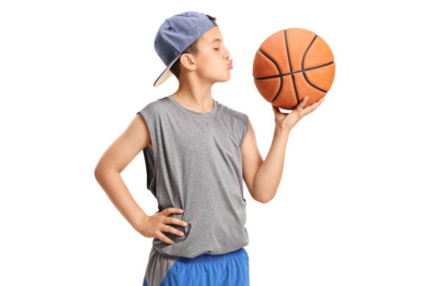istock Boy kissing a basketball 822555528