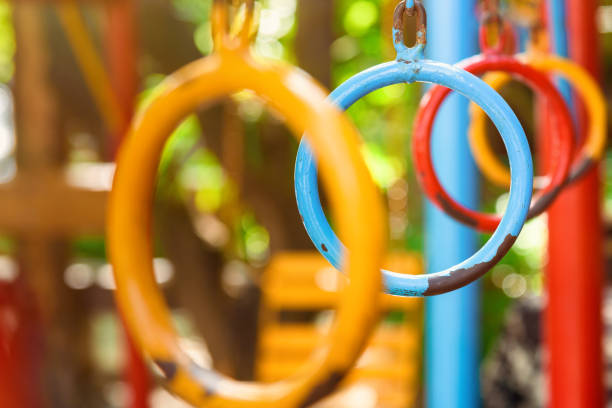 Hanging Climbing Rings In A Playground, colorful climbing ring.selective focus