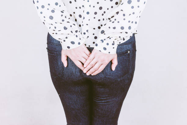 istock Woman has Diarrhea Holding her Butt 822564648