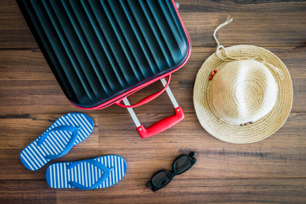 istock Woman clothing with suitcase 822564678