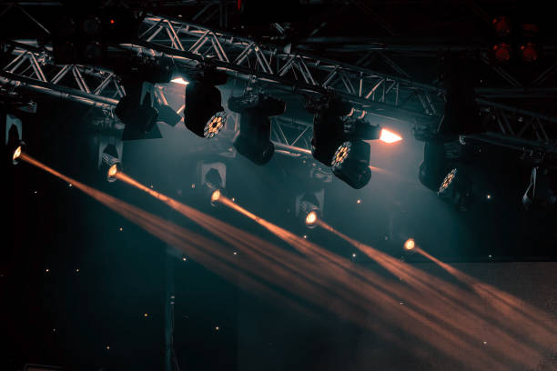 istock luminous rays from concert lighting against a dark background, musical instrument concept 822571304