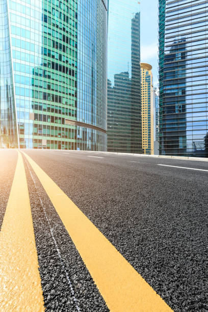istock empty asphalt road and modern buildings in shanghai 822579492