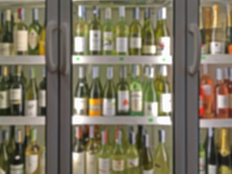 Supermarket shelf defocus background - chilled wine