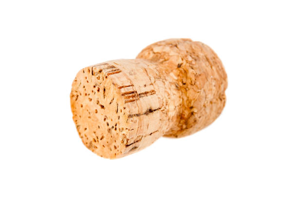 istock Champagne cork closeup on white background 822592776