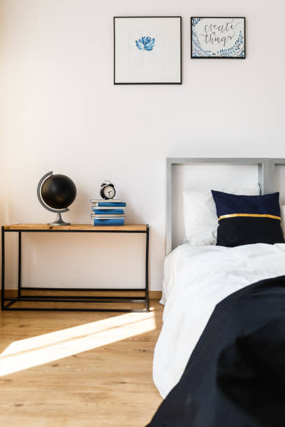 istock Wooden nightstand in bedroom 822599470