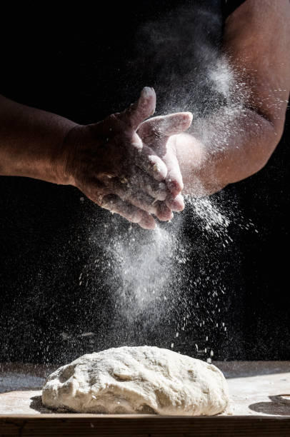 istock Senior woman bakes Christmas pastries 822608280