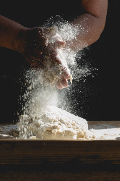 istock Senior woman bakes Christmas pastries 822608286