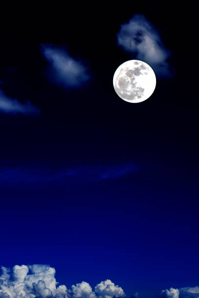 istock Blue moon and cloud  in the dark sky at night , color effect 822616380