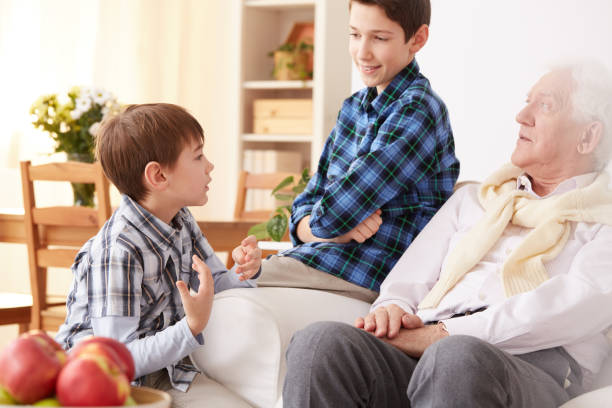 istock Grandfather talking with grandsons 822616728