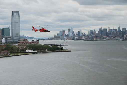 View from the Statue of Liberty toward Manhattan with an Ambulance helicopter passing by.