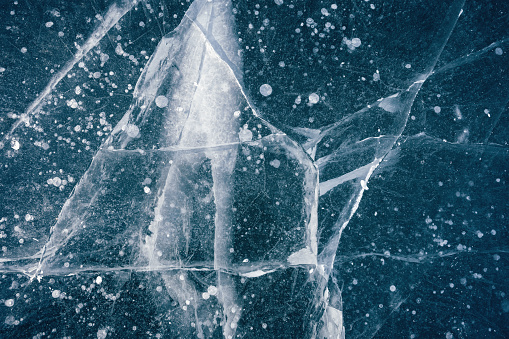 Winter background: Frozen lake surface.