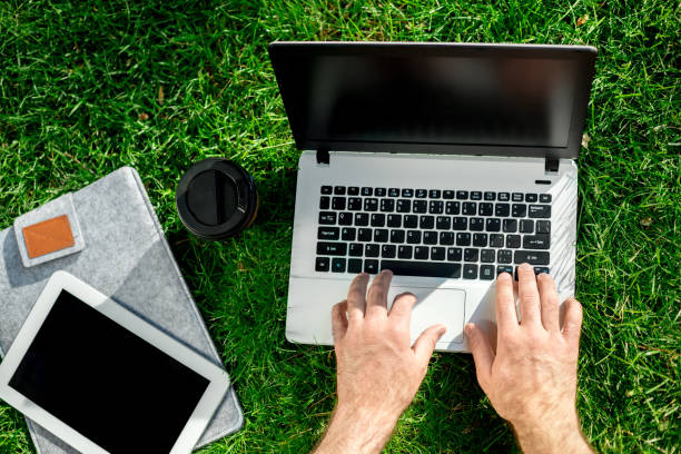 istock Close-up shot of handsome man's hands touching laptop computer's screen 822637052