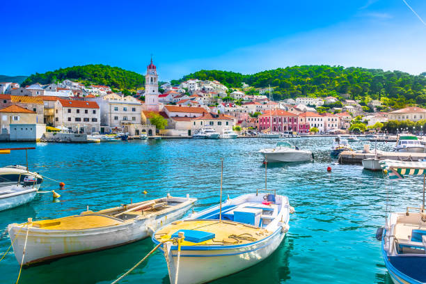 Pucisca Brac summer view. Seafront scenery of small mediterranean village Pucisca on Island Brac, tourist summer resort in Croatia, Europe. croatia stock pictures, royalty-free photos & images