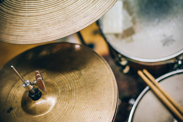 istock Closeup of drumsticks lying on the drum set 822672144