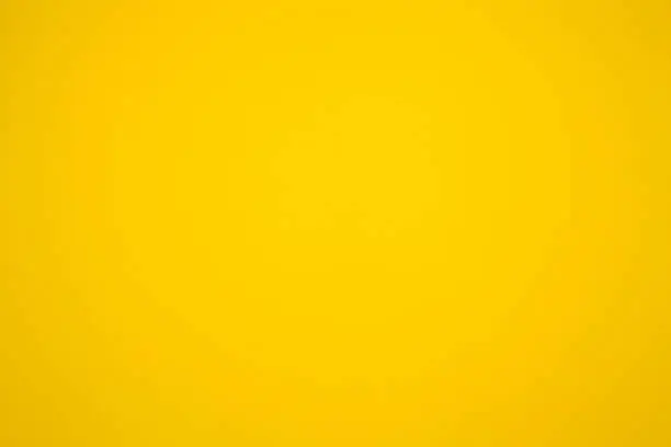 Photo of yellow painted wall, yellow color backgrounds