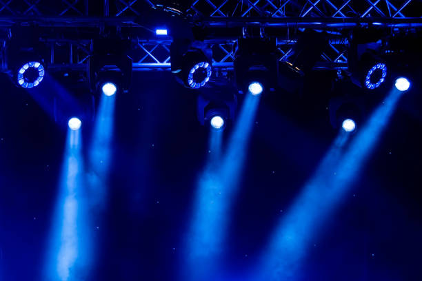 istock blue luminous rays from concert lighting against a dark background, musical instrument concept 822674032