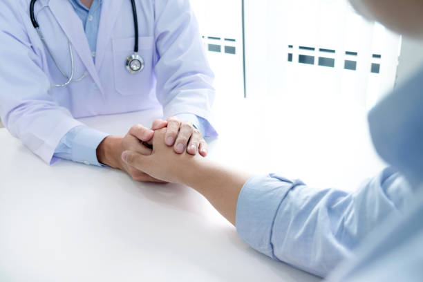 istock Hand of doctor reassuring his patient 822686572